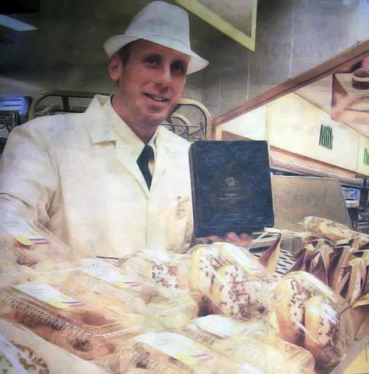 Paul and his later Father John standing outside Jones Bros. Bakery in 1999